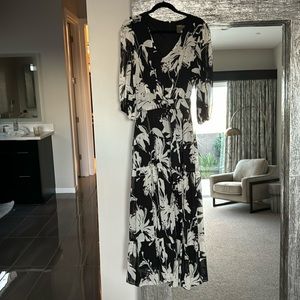 Stunning black floral print, mid calf, 3/4 length sleeve dress by Taylor.